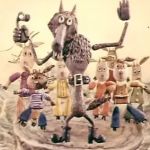 Усыновленный Колобок, Волк-сторож и хор мальчиков-козликов под руководством Серого